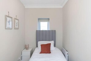 2 dormitorios, tabla de planchar con plancha, wifi y ropa de cama