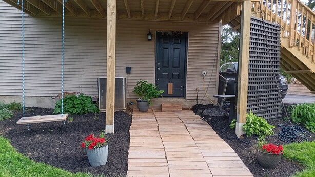 A wooden porch with a sign reading "Ballet Field Bathroom." - Forget your worries and enjoy some peace in the beautiful Lancaster Guest House. (New Holland)
