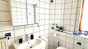 Ducha, secador de pelo, toallas