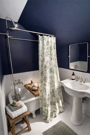 Hair dryer, towels, soap, toilet paper - Classic Red Farmhouse Retreat by Nature Preserve (Patterson)