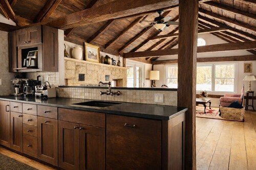 Classic Red Farmhouse Retreat by Nature Preserve