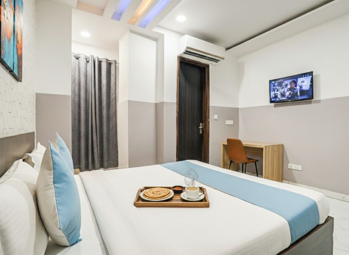 Desayuno buffet (INR 150 por persona) 