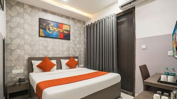 Deluxe Double Room | In-room safe, desk, laptop workspace, blackout drapes