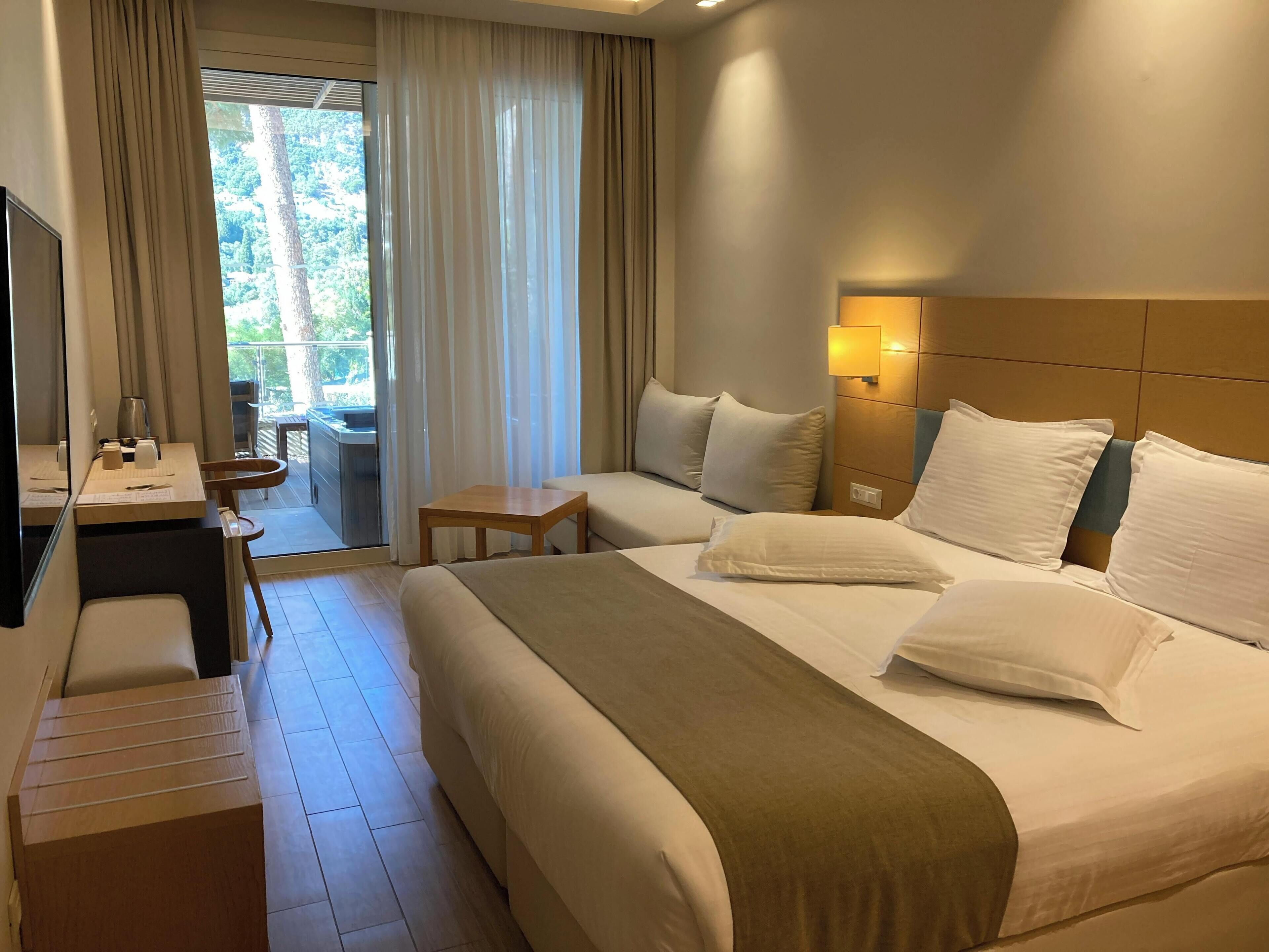 In-room safe, desk, laptop workspace, blackout curtains