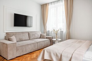 Comfort Studio Suite, 1 Double Bed with Sofa bed, Bathtub | Living area | Flat-screen TV - Old Town & Riverside Brzozowa Apartment by Downtown Apartments (Warsaw)