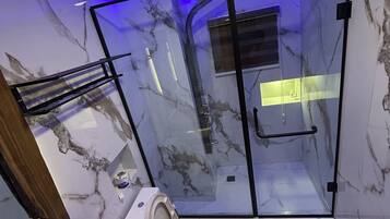 Economy Single Room | Bathroom | Shower, towels, soap, toilet paper