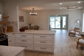 Fridge, microwave, oven, stovetop - Waterfront Escape - Beach + Golf Cart + Family Memories - Indian Rocks Beach, FL (Indian Rocks Beach)