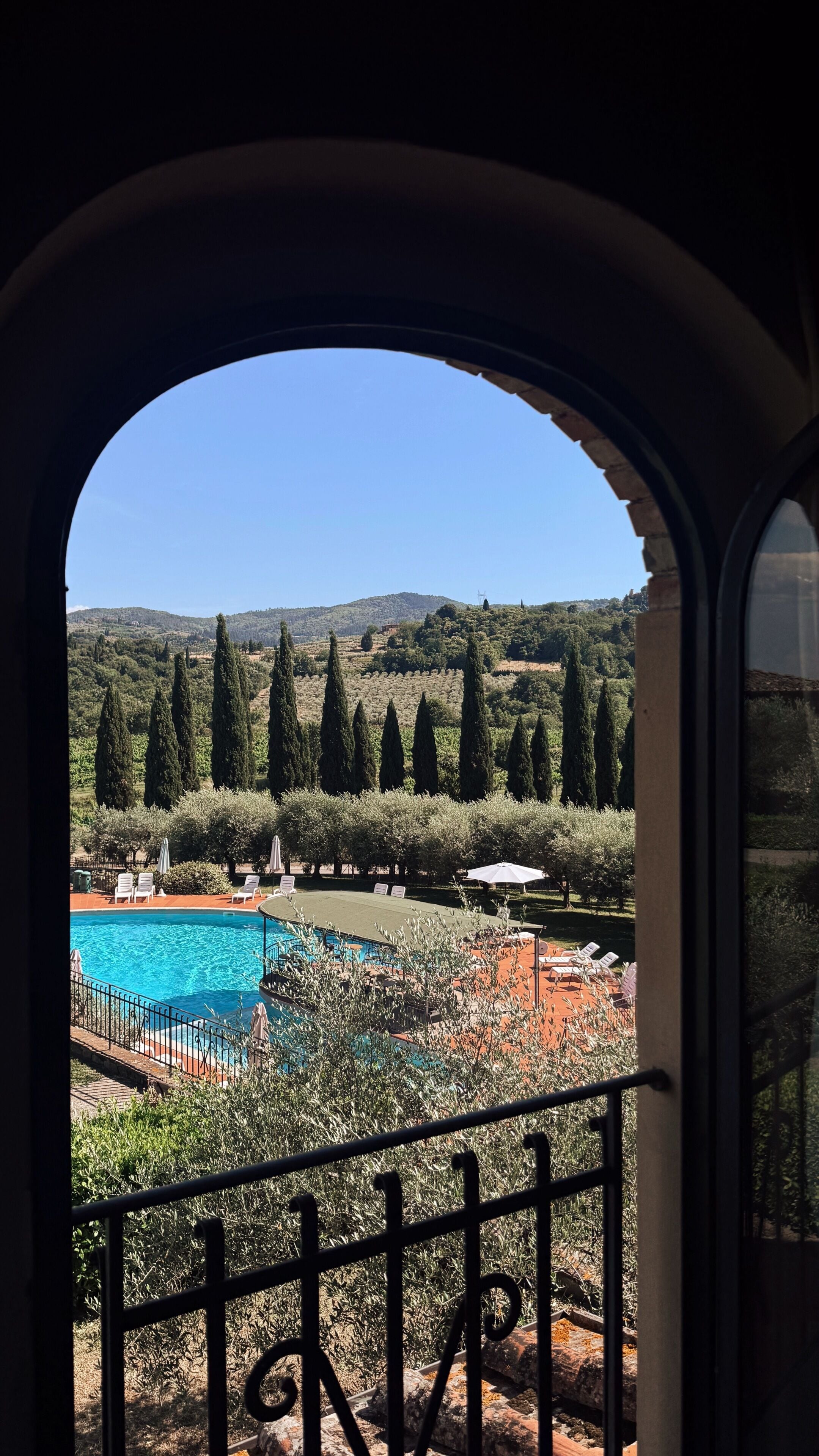 Seasonal outdoor pool, open 9:00 AM to 8:00 PM, pool umbrellas