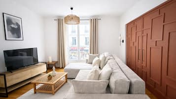 Apartamento | Área de estar | TV 40 polegadas com canais a cabo