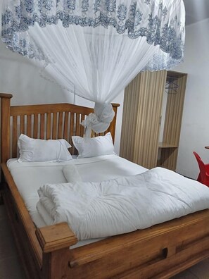 Habitación individual Deluxe | Wifi gratis y ropa de cama