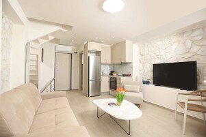 Superior Villa, Balcony, Sea View | Living area | Flat-screen TV