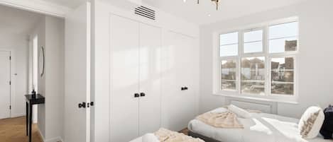 A modern bedroom with two beds, a large window with a city view, and a hallway leading to another room.