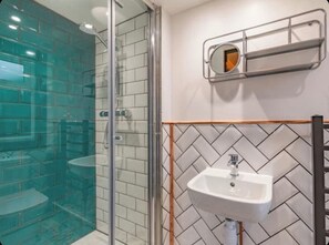 Shower, towels, toilet paper