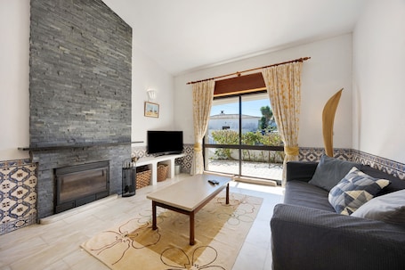 TV, fireplace. Villa 'Casa 54' with Private Terrace and Wi-Fi