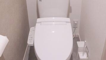 Hair dryer, towels, shampoo