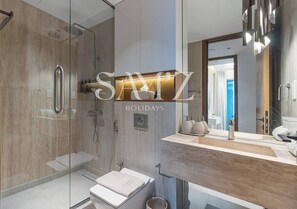 Hair dryer, towels, soap, toilet paper - Stylish 2BR in Downtown Views - High Floor 2906 (Dubai)