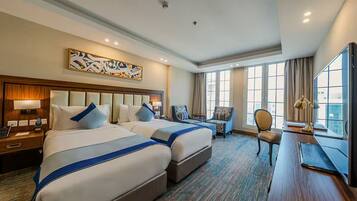 Habitació amb dos llits individuals superior, vistes parcials al mar | Vista de la ciutat