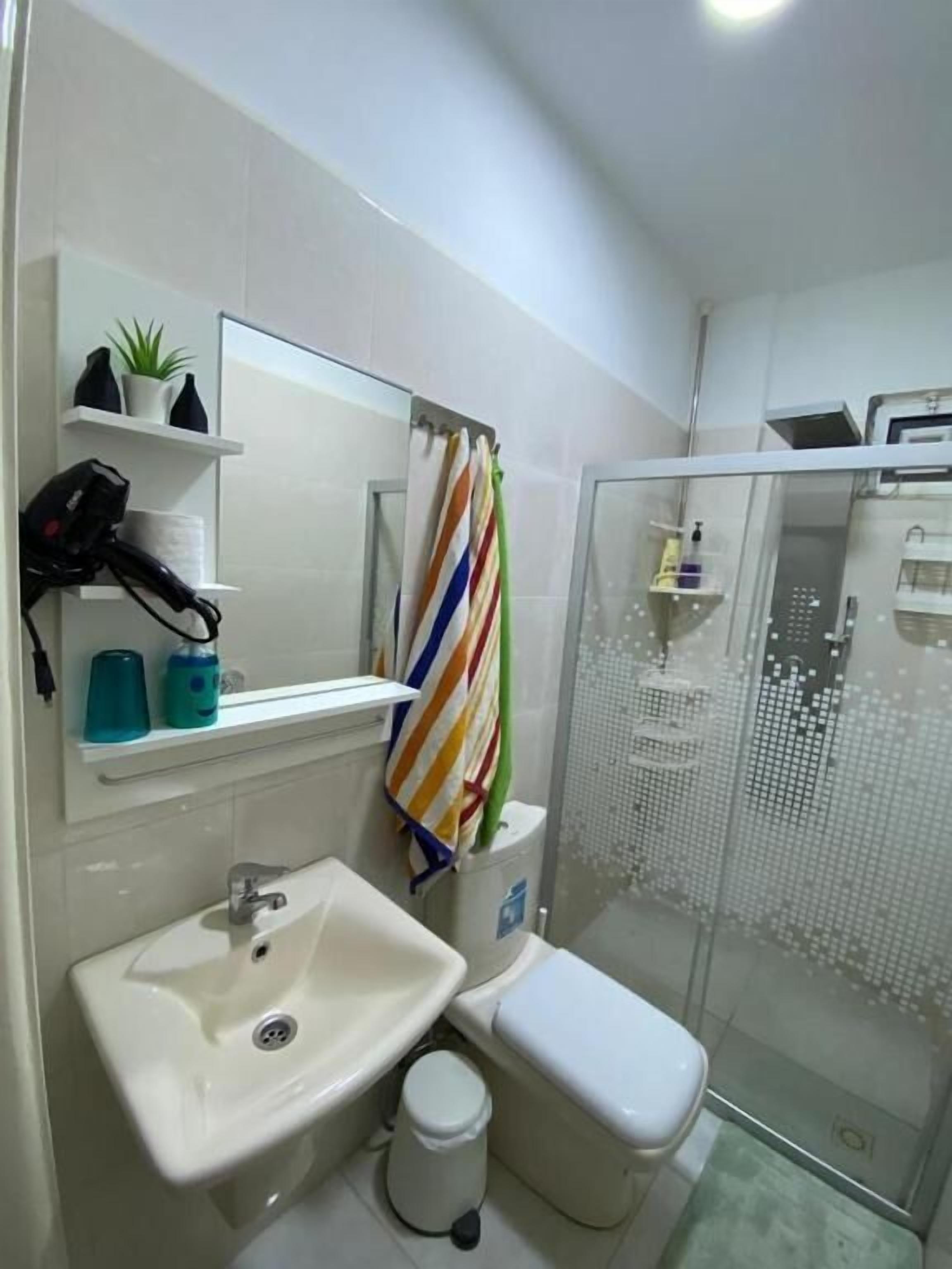 Shower, free toiletries, hair dryer, towels