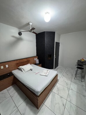 Basic Suite, Air conditioning, Garden View | Minibar, desk, laptop workspace, free WiFi - Motel Fascinação (Contagem)