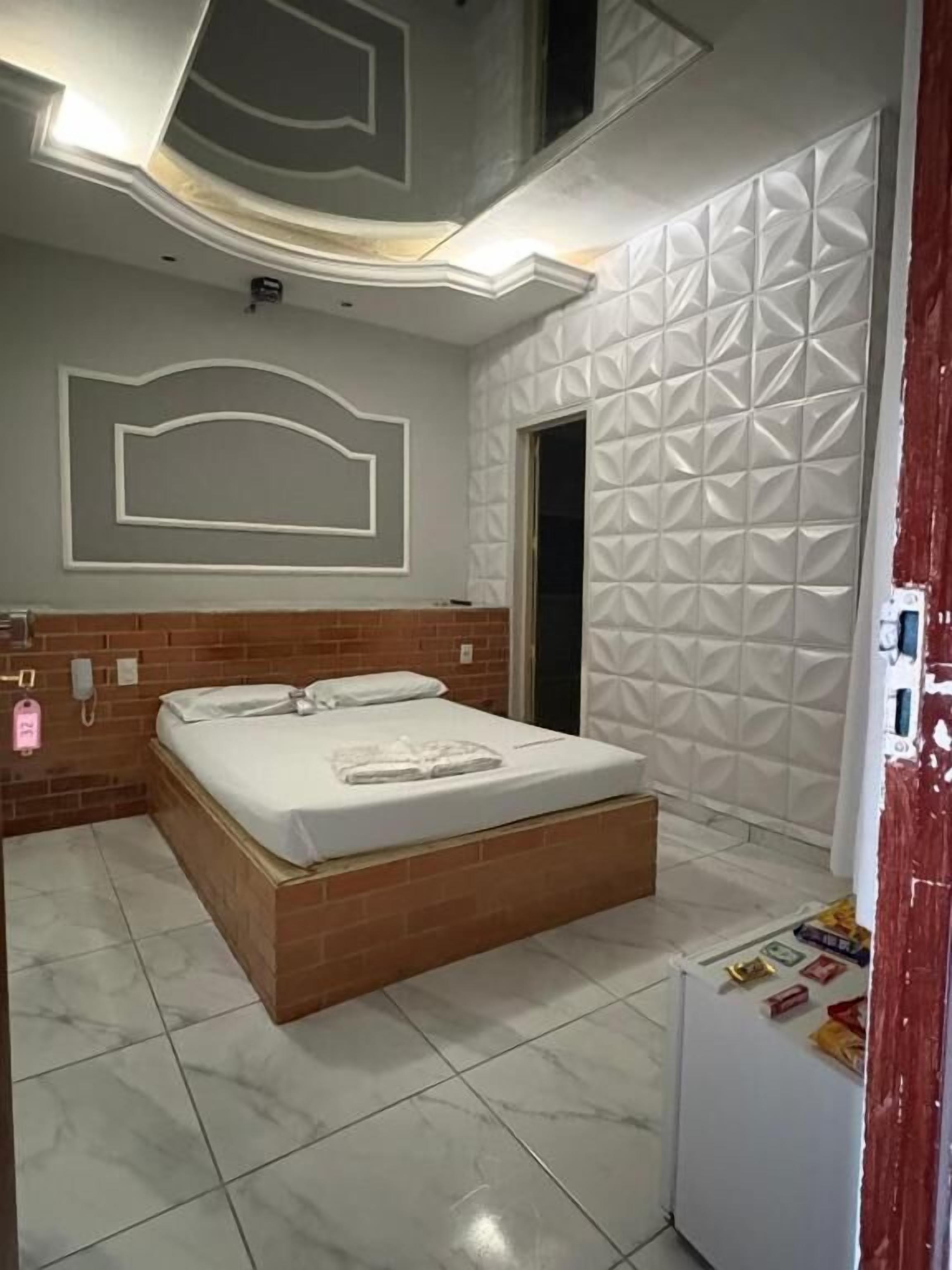 Basic Suite, Air conditioning, Garden View | Minibar, desk, laptop workspace, free WiFi