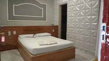 Basic Suite, Air conditioning, Garden View | Minibar, desk, laptop workspace, free WiFi