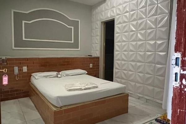 Basic Suite, Air conditioning, Garden View | Minibar, desk, laptop workspace, free WiFi