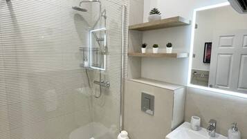 Hair dryer, towels, soap, toilet paper