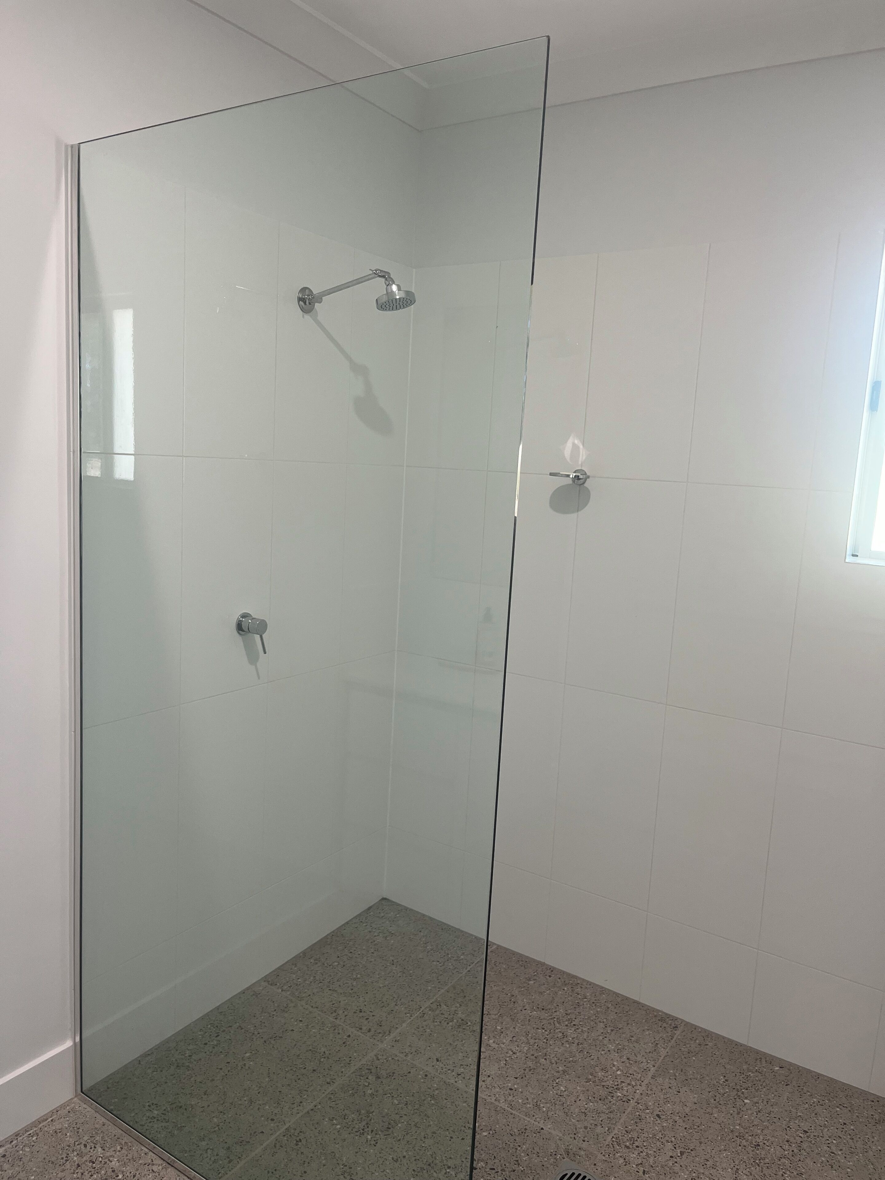 Shower, towels, soap, toilet paper
