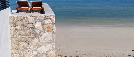 Sun-loungers, beach towels