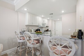 Fridge, microwave, dishwasher, coffee/tea maker - Exclusive beachfront units and breathtaking ocean views at Princess Condos. (Panama City Beach)