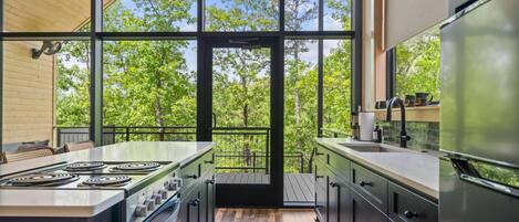 Réfrigérateur, four à micro-ondes, surface de cuisson, cafetiÚre-théiÚre