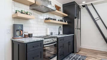 Fridge, microwave, stovetop, coffee/tea maker