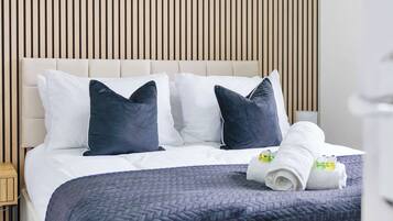 Iron/ironing board, travel crib, WiFi, bed sheets