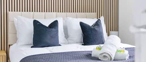 Iron/ironing board, travel crib, WiFi, bed sheets