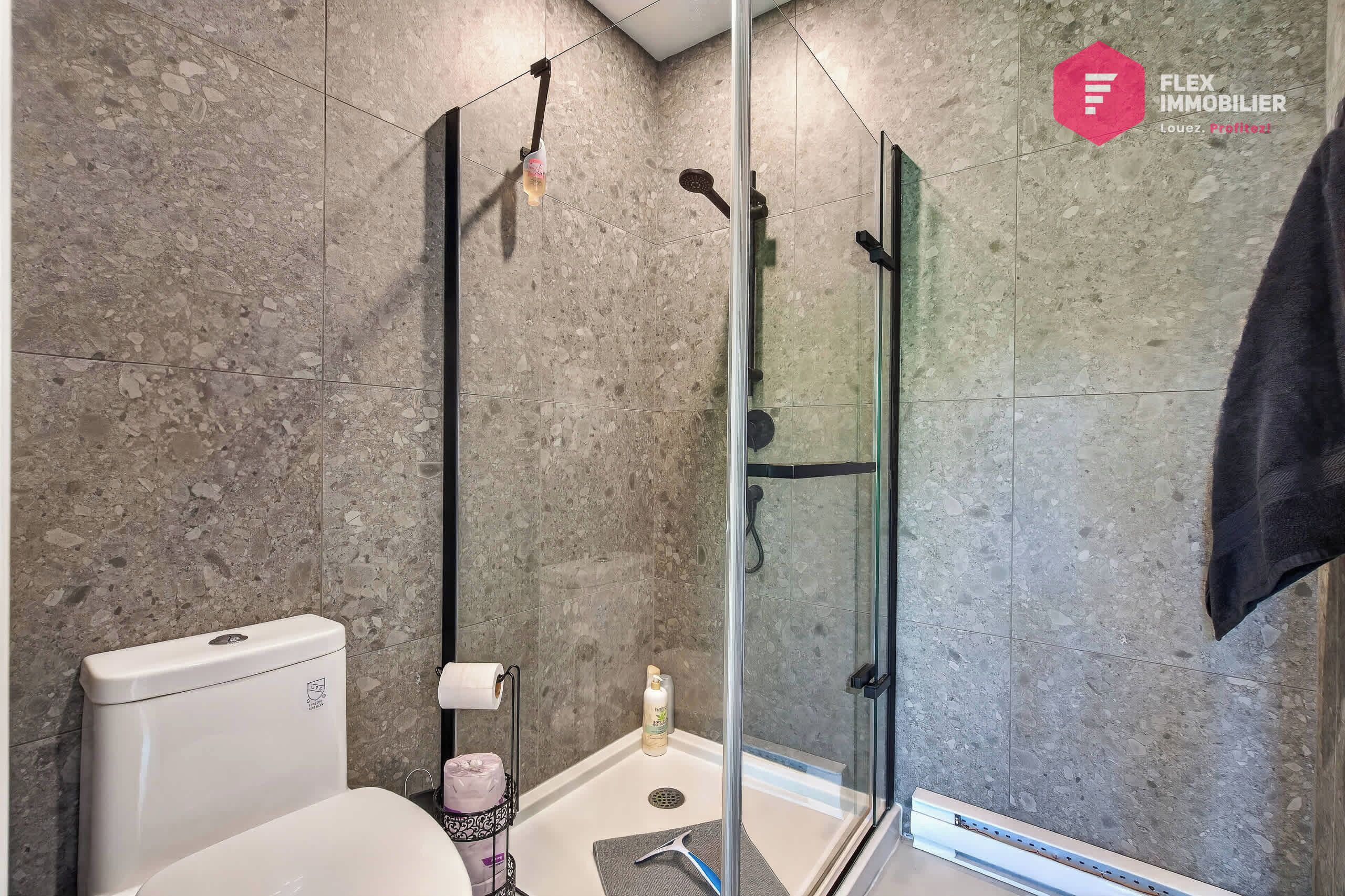 Shower, hair dryer, towels, shampoo