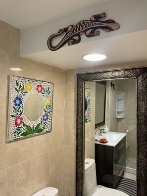 Shower, hair dryer, towels, soap