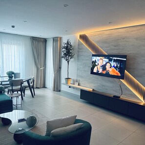 Apartamento familiar, balcón, vistas a la ciudad | Zona de estar
