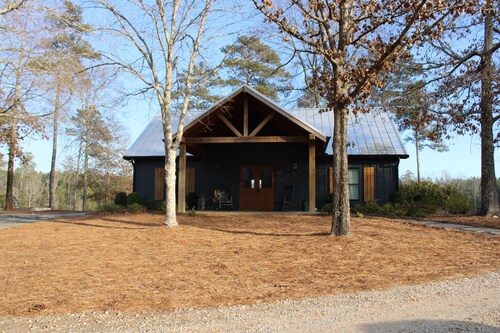 Welcome to our peaceful rustic farmhouse retreat, nestled on private acreage.