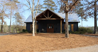 Welcome to our peaceful rustic farmhouse retreat, nestled on private acreage.