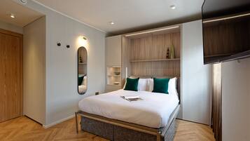 1 bedroom, desk, iron/ironing board, travel cot