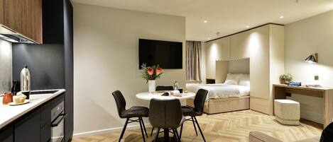 1 bedroom, desk, iron/ironing board, travel cot