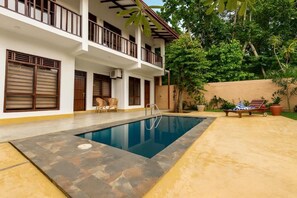 Outdoor pool, pool umbrellas, pool loungers