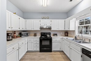 Fridge, microwave, oven, stovetop - Captains Cabin Too | 5-Min Walk to Beach • Easy Coastal Living (North Myrtle Beach)