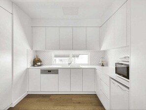 Frigorífico, microondas, horno y placa de cocina