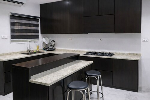 Luxury 4-bedroom house in a secure estate inside Abuja with power supply and AC