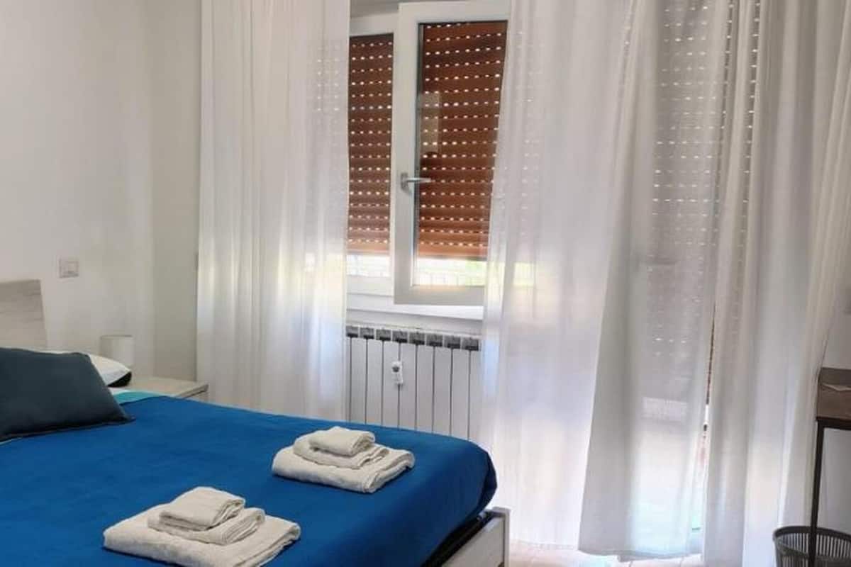 Double Room, Balcony, City View | Iron/ironing board, free WiFi