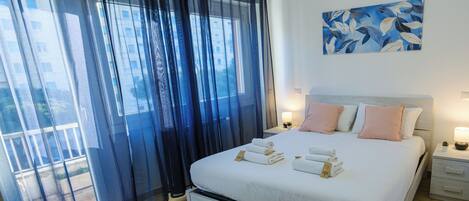 Double Room, Balcony, City View | Iron/ironing board, free WiFi, bed sheets