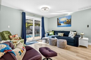 TV, fireplace, offices - Flora & Flair - 3BD Home|Beach|Heated POOL (Dunedin)