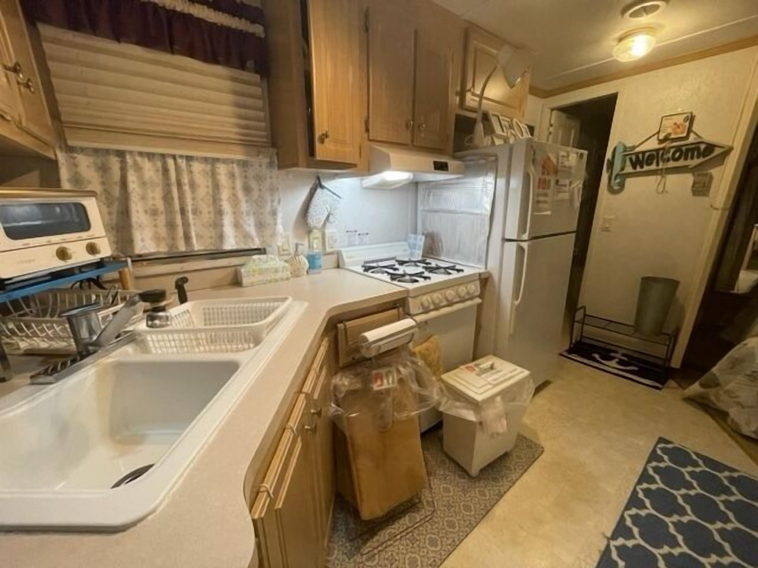 Fridge, microwave, stovetop, cookware/dishes/utensils