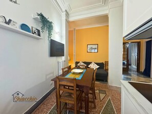 Apartment, 1 Queen Bed with Sofa bed, Kitchenette, City View | Living area | 45-inch flat-screen TV with satellite channels, Netflix - Satrico43 - ChiacchioProperty (Rome)